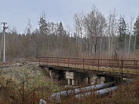 Мост через речку с коллектором